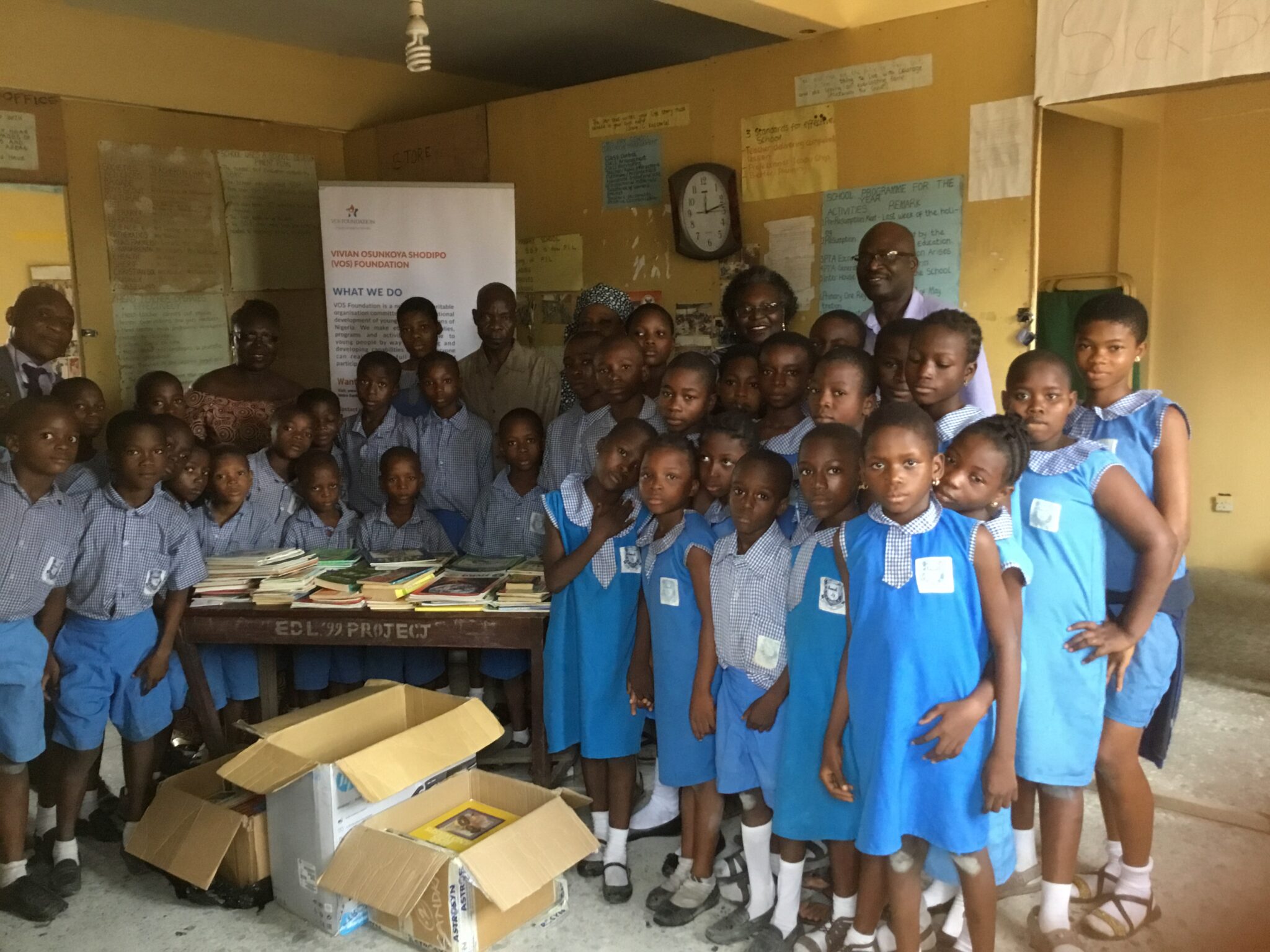 Pupils and Teachers at CMS Primary School, Lagos receiving books donated by VOS Foundation-